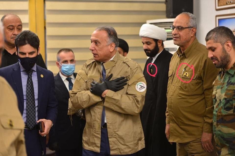 استقبال فرمانده حشدالشعبی از نخست وزیر عراق با تصویر حاج قاسم سلیمانی (عکس)