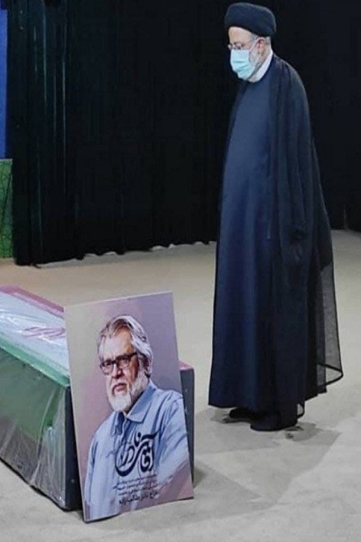 حضور رييسى در کنار پیکر نادر طالب‌زاده در معراج شهدا