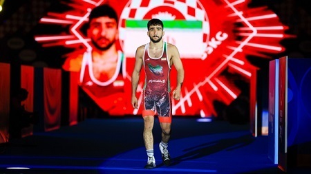 پیام احمدی؛ از دستفروشی تا سکوی جهانی کشتی + عکس
